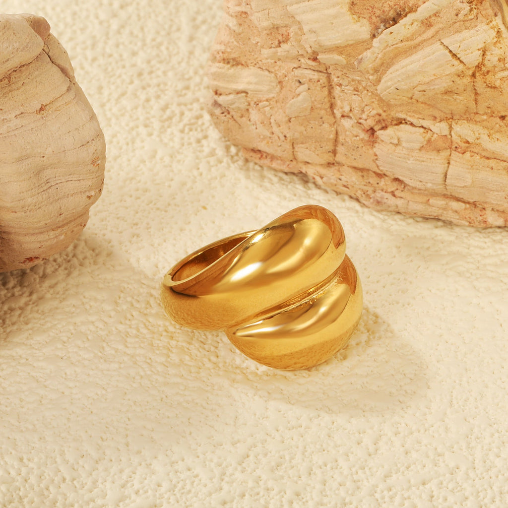 Overdreven gouden ring