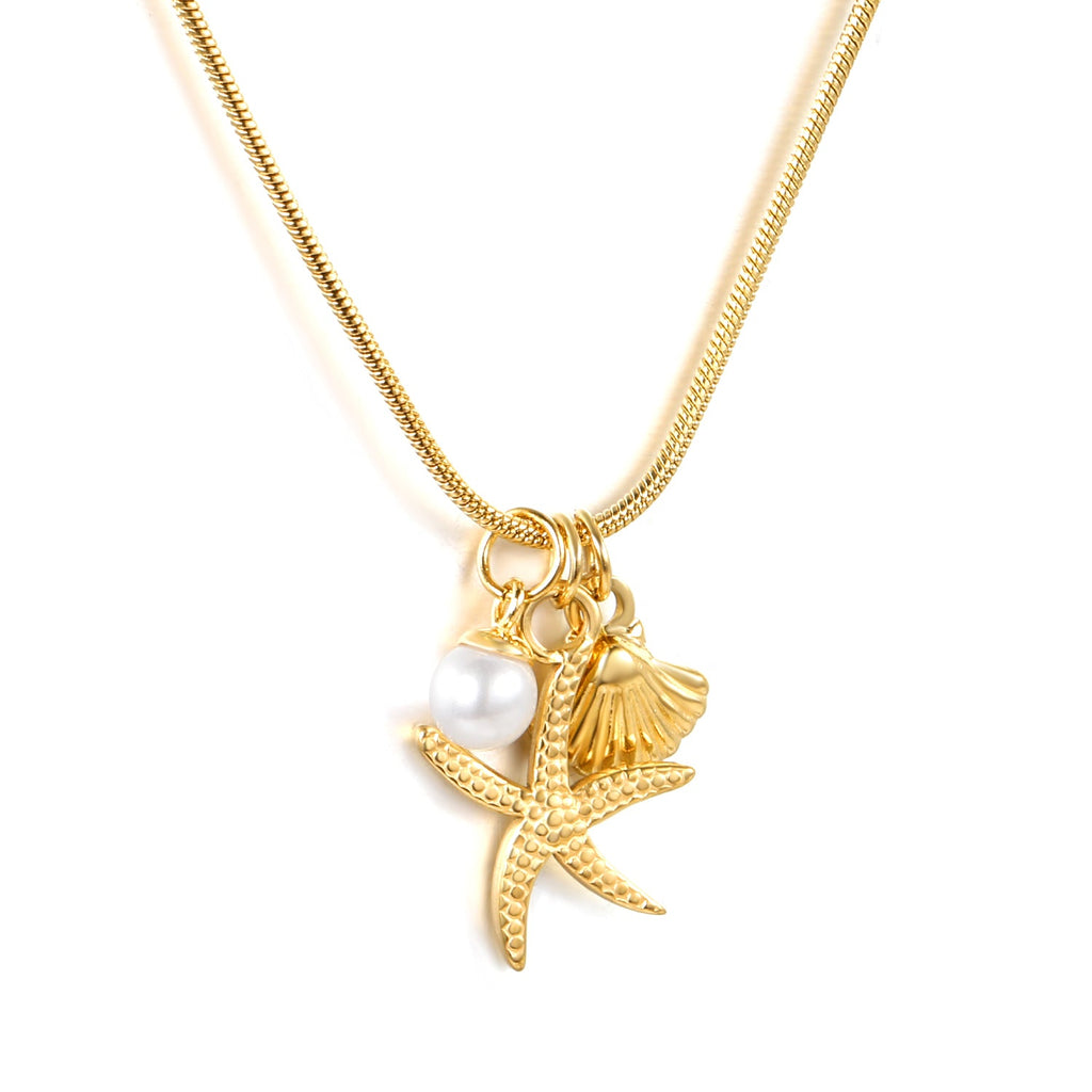 Gold stainless steel necklace with starfish, shell, and pearl charms on a round snake chain — elegant coastal-inspired jewelry by JSC Jewelry.