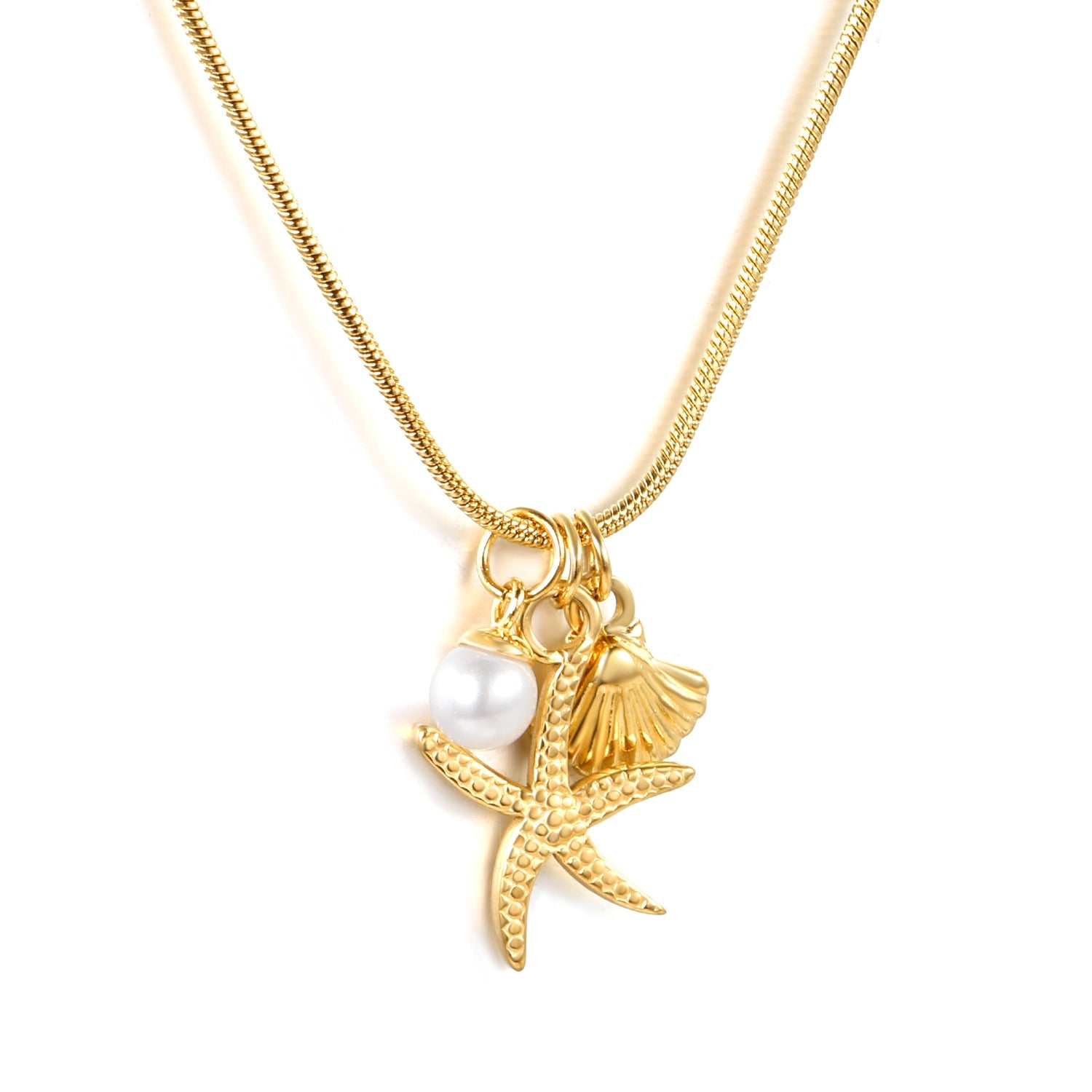 Gold stainless steel necklace with starfish, shell, and pearl charms on a round snake chain — elegant coastal-inspired jewelry by JSC Jewelry.