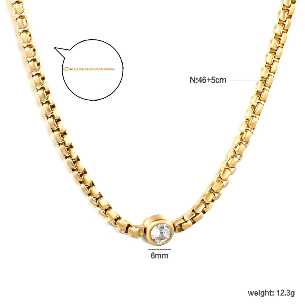 Ketting met ingelegde witte diamant – elegantie van staal en goud