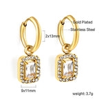 Cirkelvormige hoepeloorbellen met rechthoekige en witte diamanten