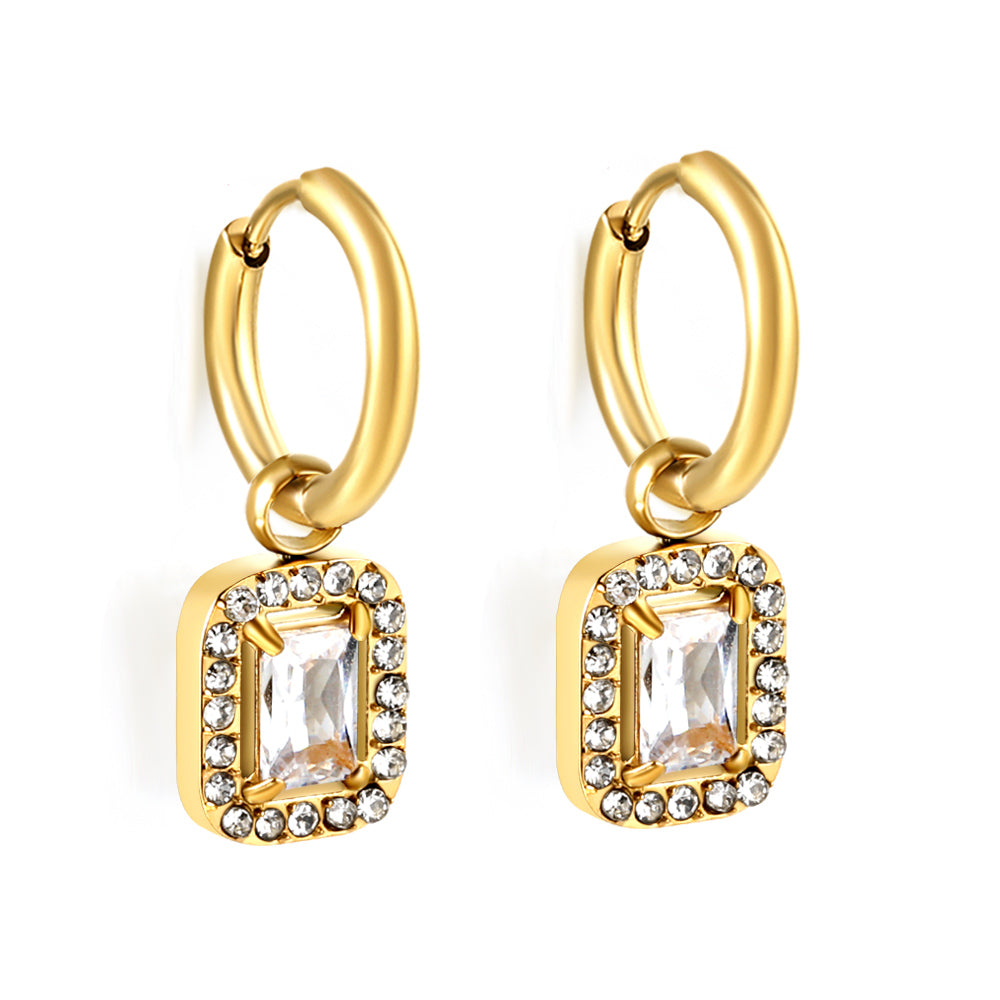 Cirkelvormige hoepeloorbellen met rechthoekige en witte diamanten