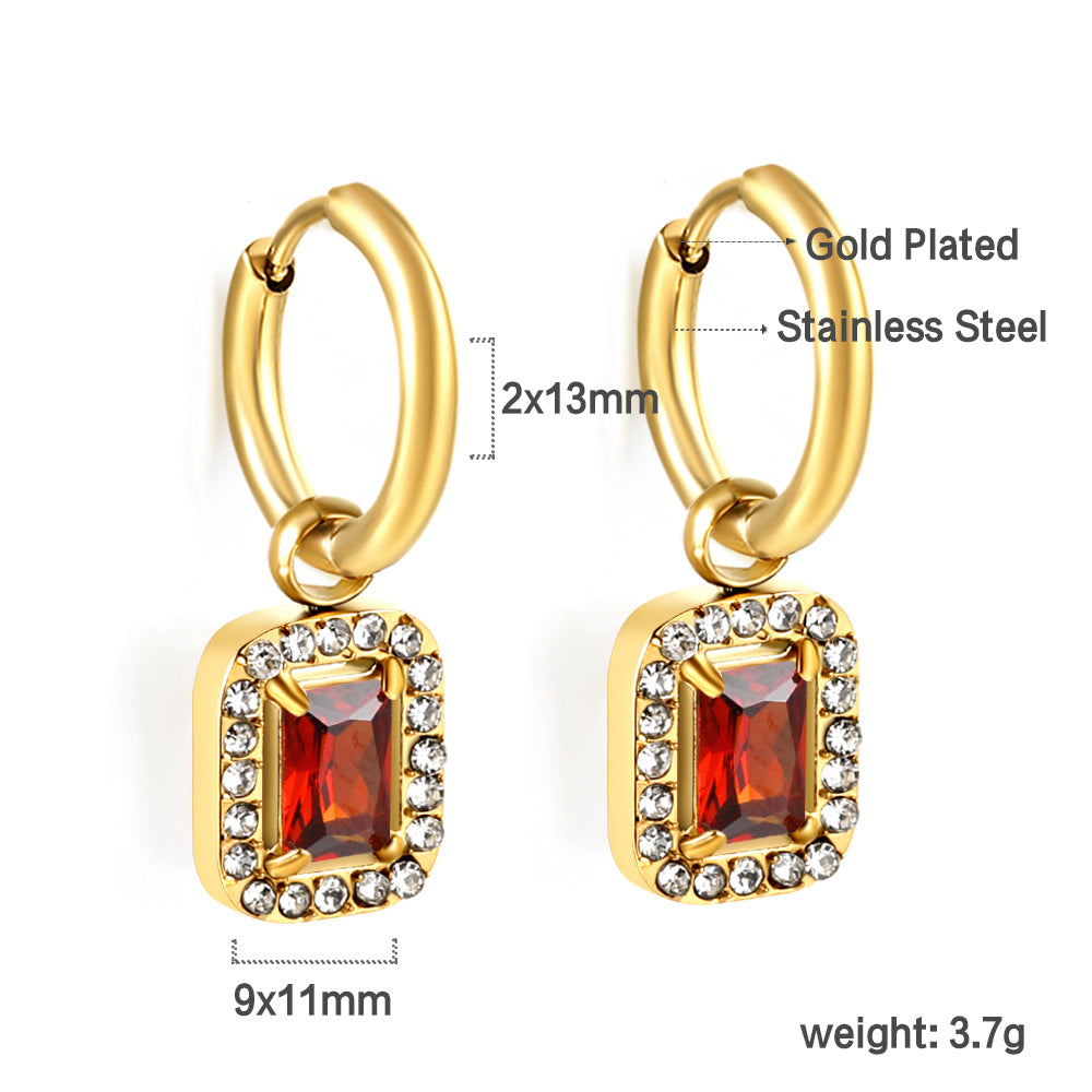 Cirkelvormige hoepeloorbellen met rechthoekige en witte diamanten