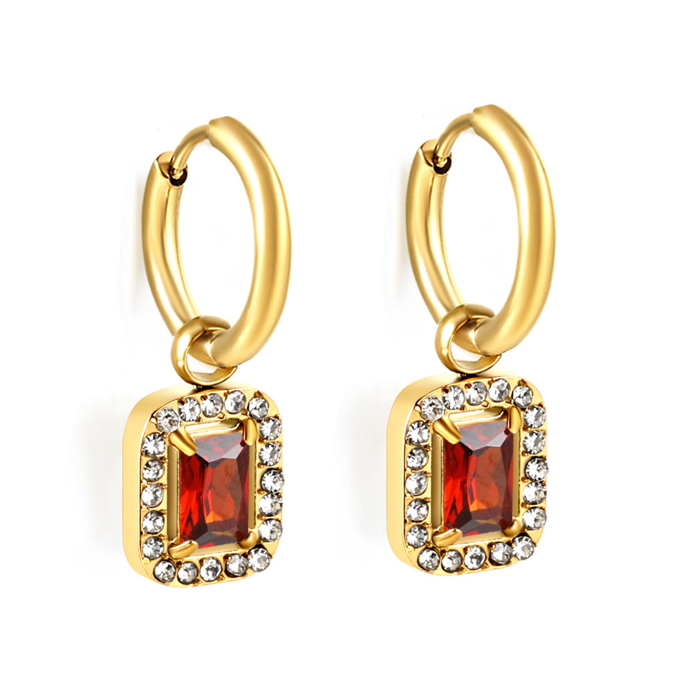 Cirkelvormige hoepeloorbellen met rechthoekige en witte diamanten