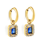 Cirkelvormige hoepeloorbellen met rechthoekige en witte diamanten