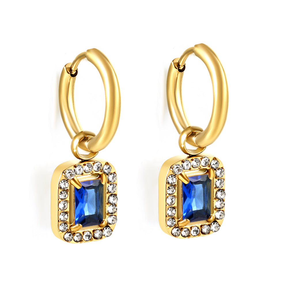 Cirkelvormige hoepeloorbellen met rechthoekige en witte diamanten