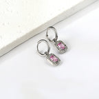 Cirkelvormige hoepeloorbellen met rechthoekige en witte diamanten