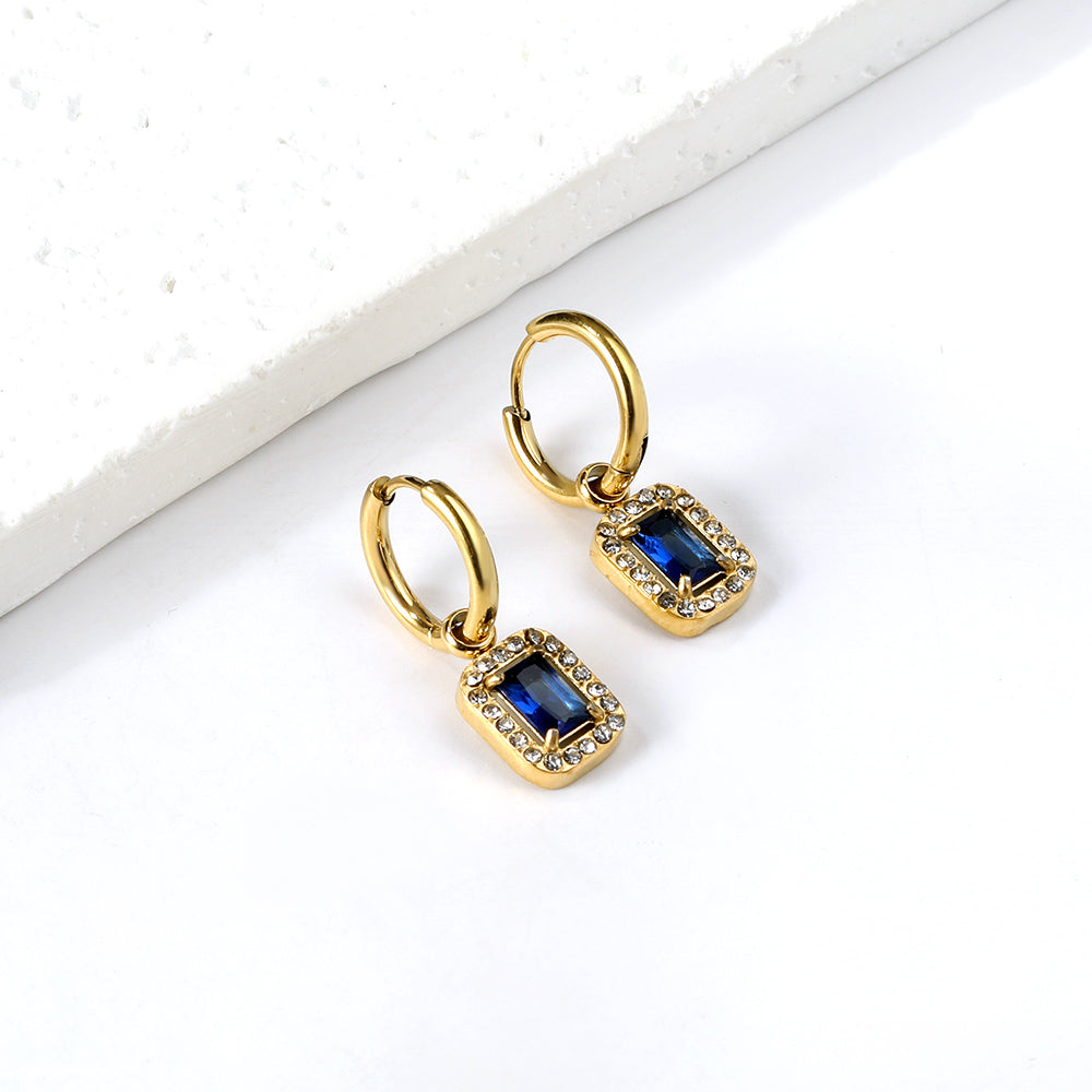 Cirkelvormige hoepeloorbellen met rechthoekige en witte diamanten