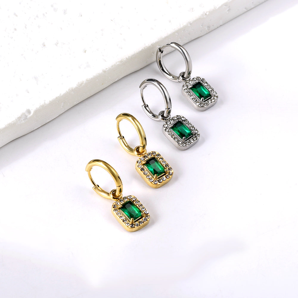 Cirkelvormige hoepeloorbellen met rechthoekige en witte diamanten