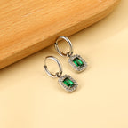 Cirkelvormige hoepeloorbellen met rechthoekige en witte diamanten