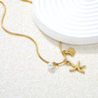 Zeester &amp; Schelp Parel Charm Ketting – Kustgoud Ontwerp