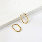 U-vormige minimalistische goudkleurige oorbellen