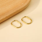 U-vormige minimalistische goudkleurige oorbellen
