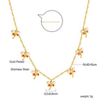 Ensemble de colliers à breloques – Coquillage, cerise, couronne et libellule