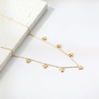 Ensemble de colliers à breloques – Coquillage, cerise, couronne et libellule