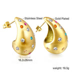 Druppelvormige holle oorbellen met witte diamanten