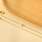 Dubbele ketting met witte diamanten armband