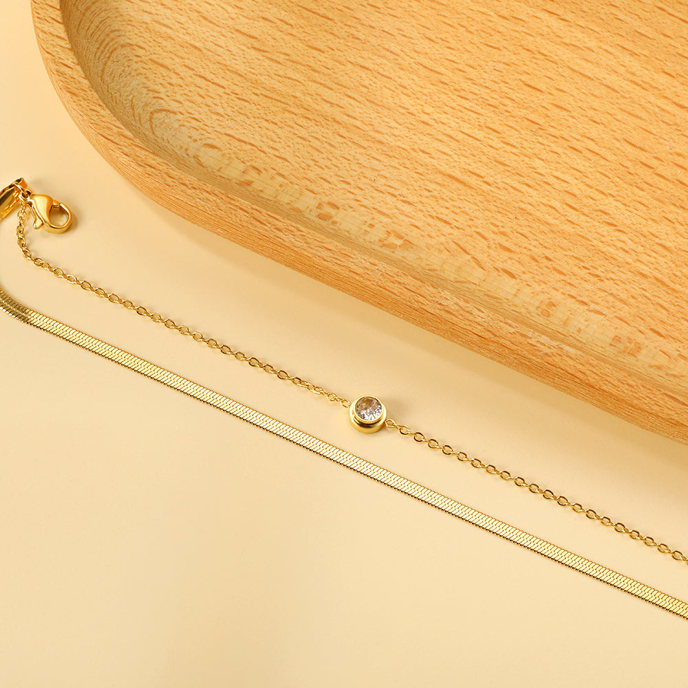 Dubbele ketting met witte diamanten armband