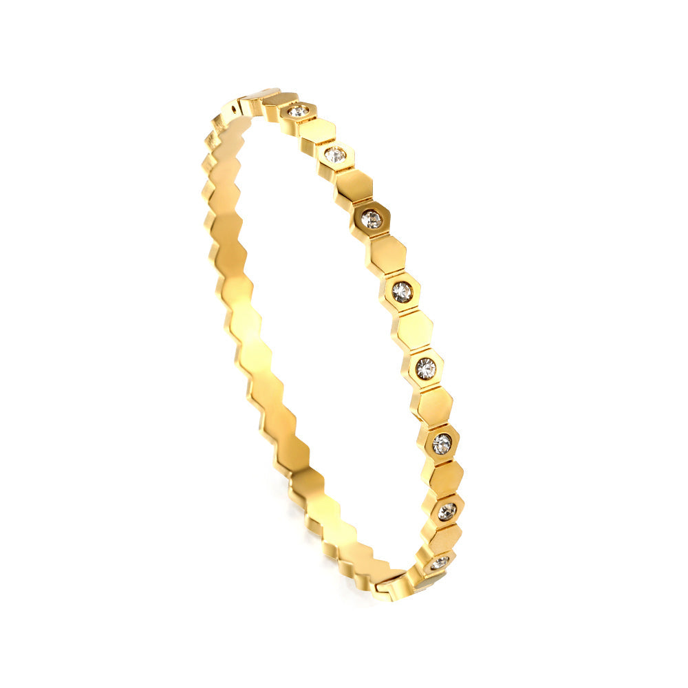 Diamanten en gouden schijfharde armband