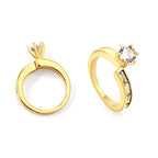 Mini-ring met klauwgesp en zirkonia