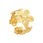 Gold flower embossed ring with botanical texture by JSC Jewelry