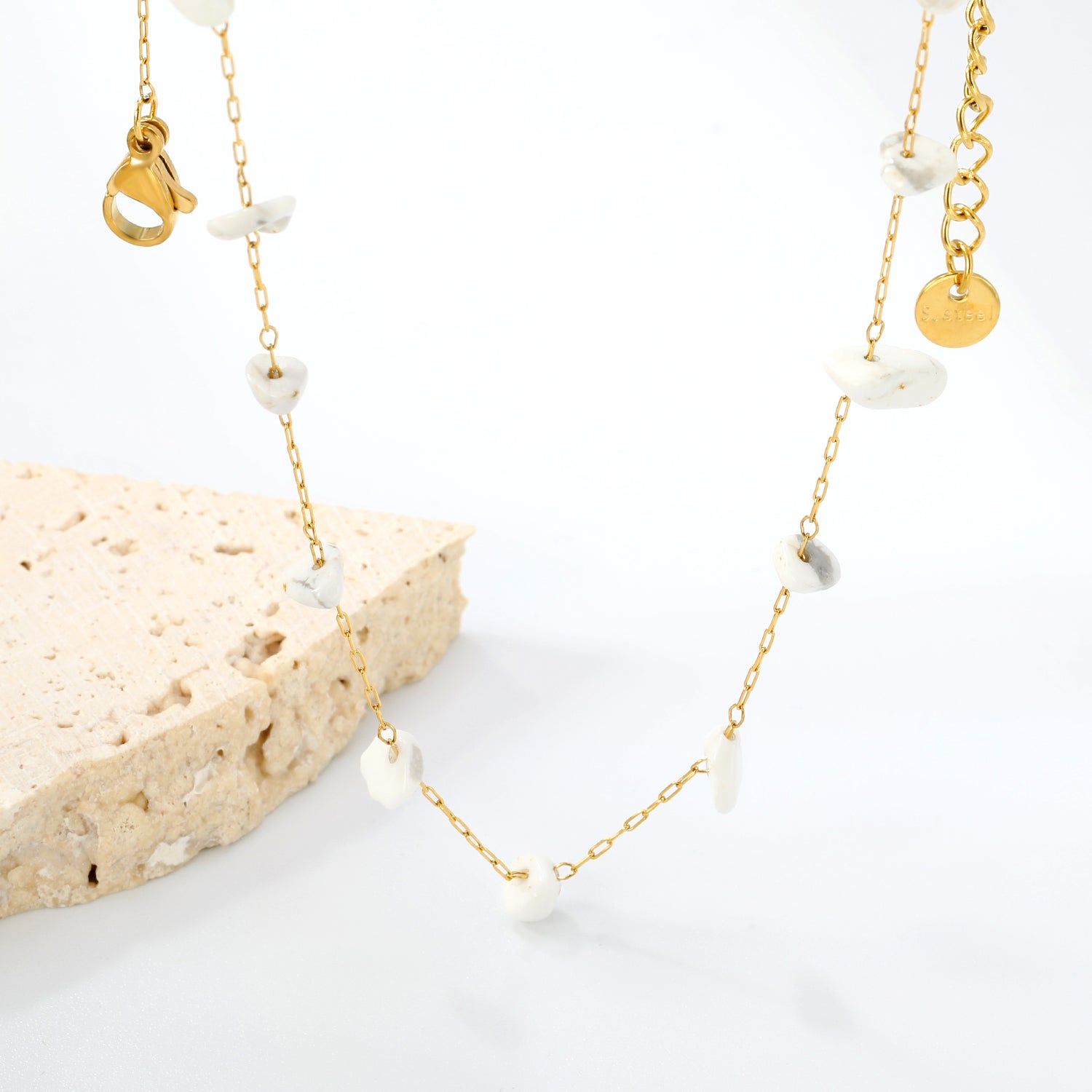 Gouden edelsteen kruisketting