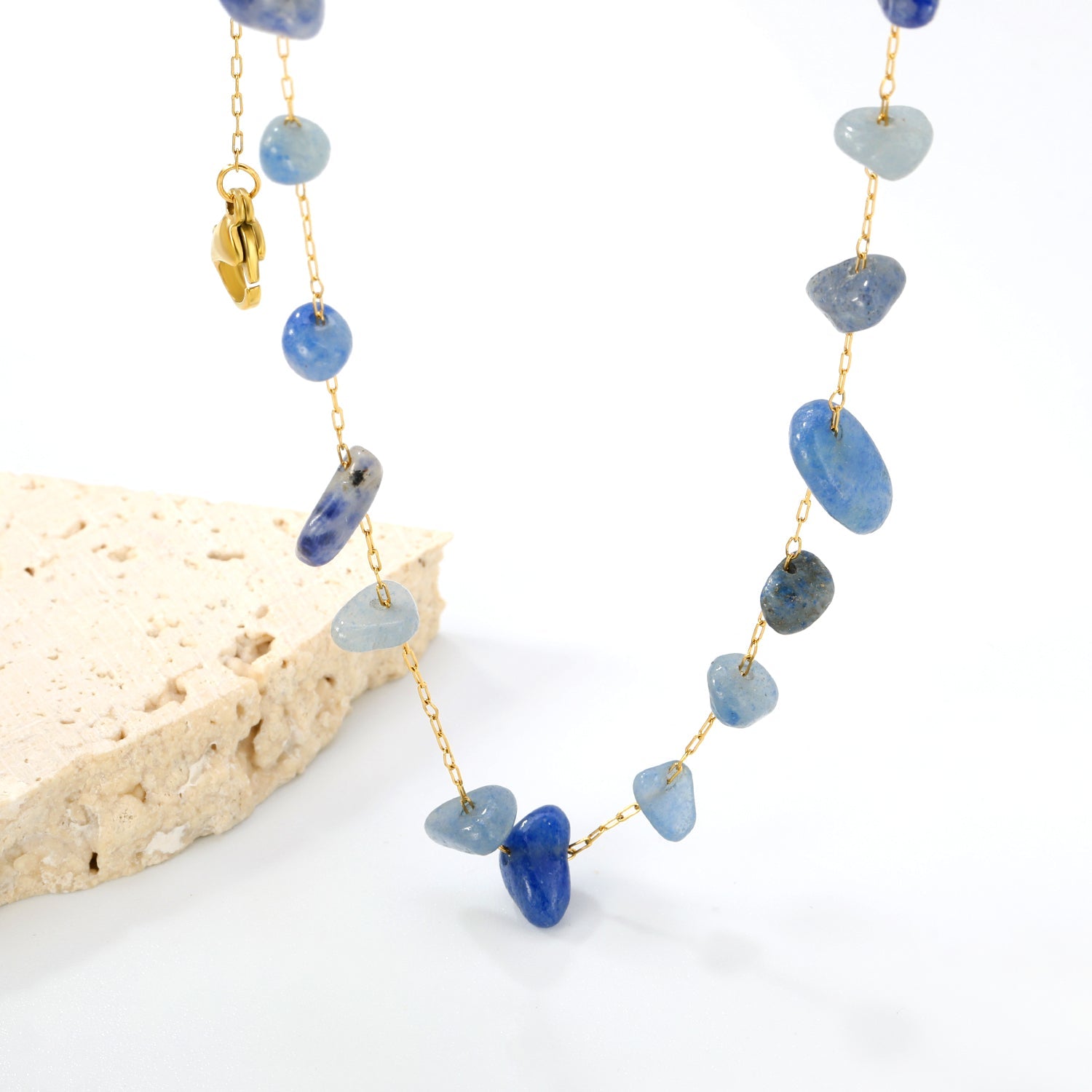 Gouden edelsteen kruisketting