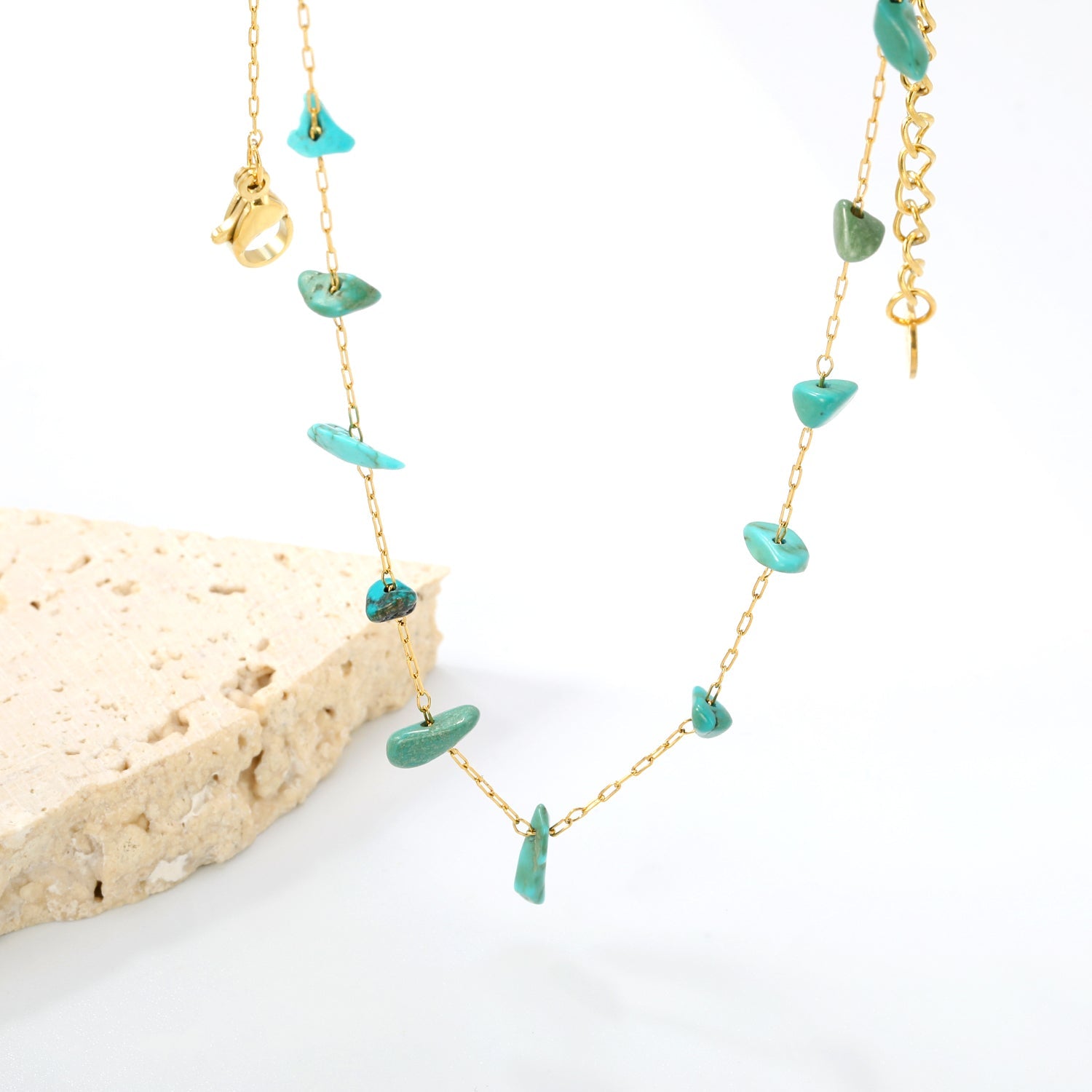 Gouden edelsteen kruisketting