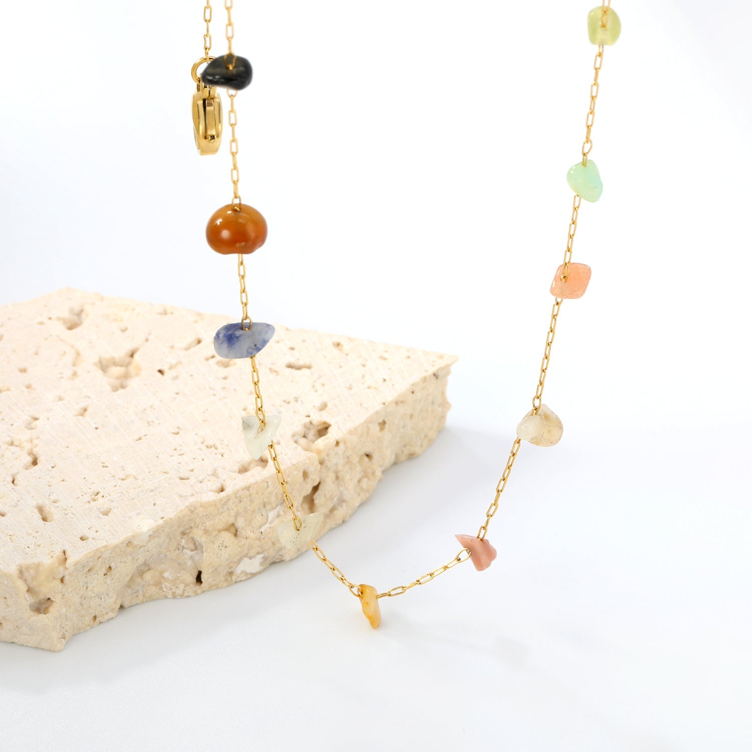 Gouden edelsteen kruisketting