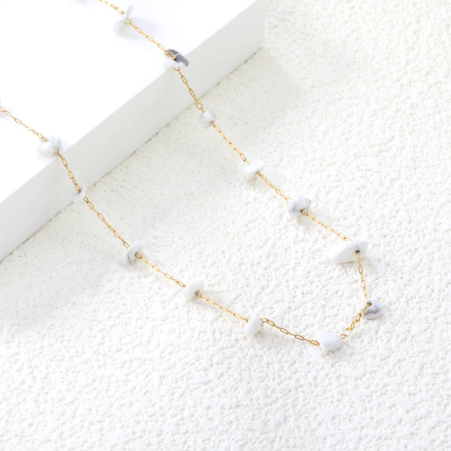 Gouden edelsteen kruisketting