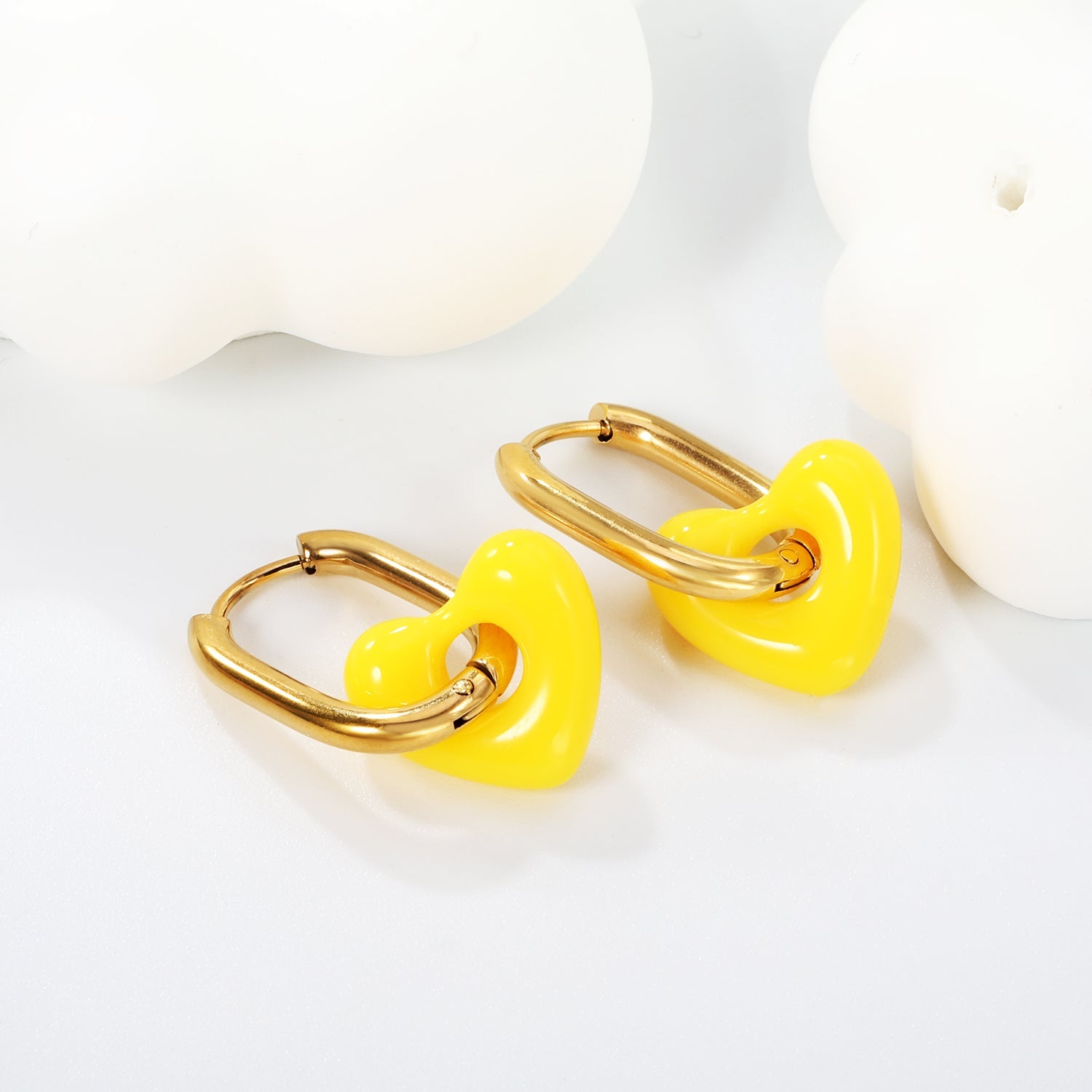 Dikke ovale en hars hartvormige oorbellen