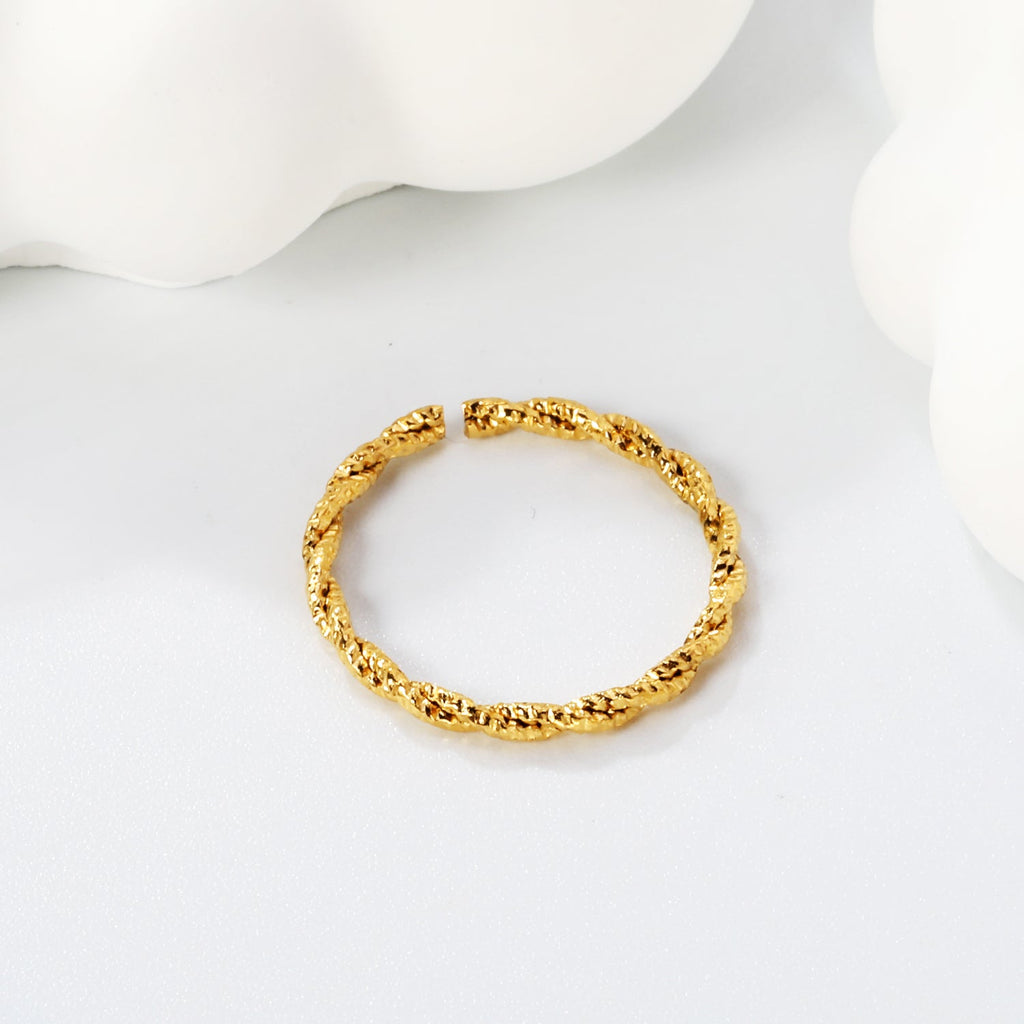 Draaiende gedraaide open ring