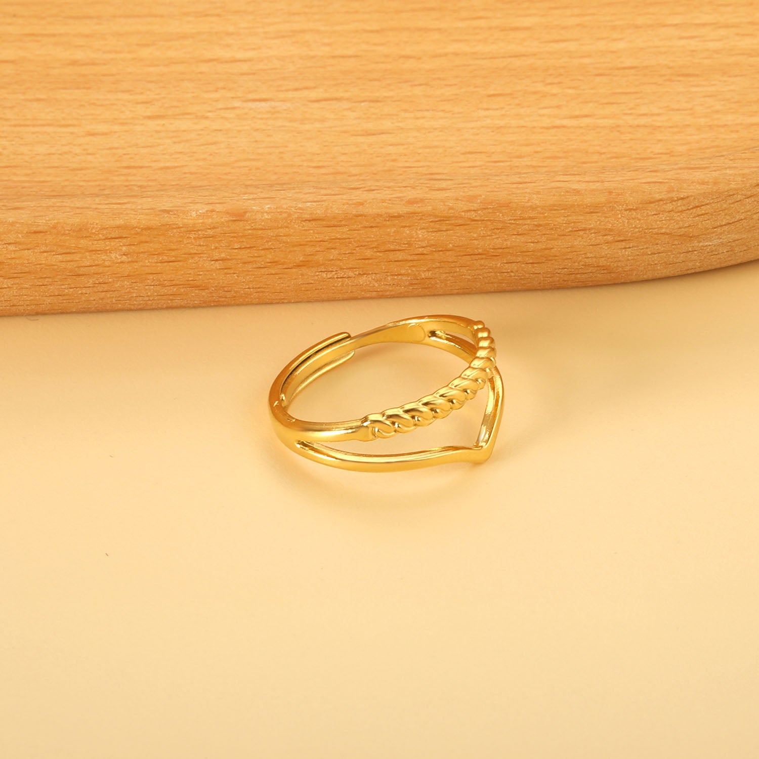 V-vormige geometrische verstelbare ring