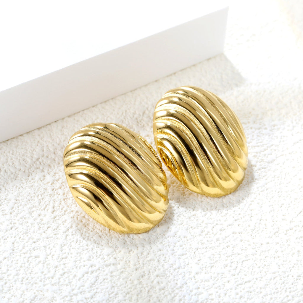 Ovale gestreepte goudkleurige oorbellen