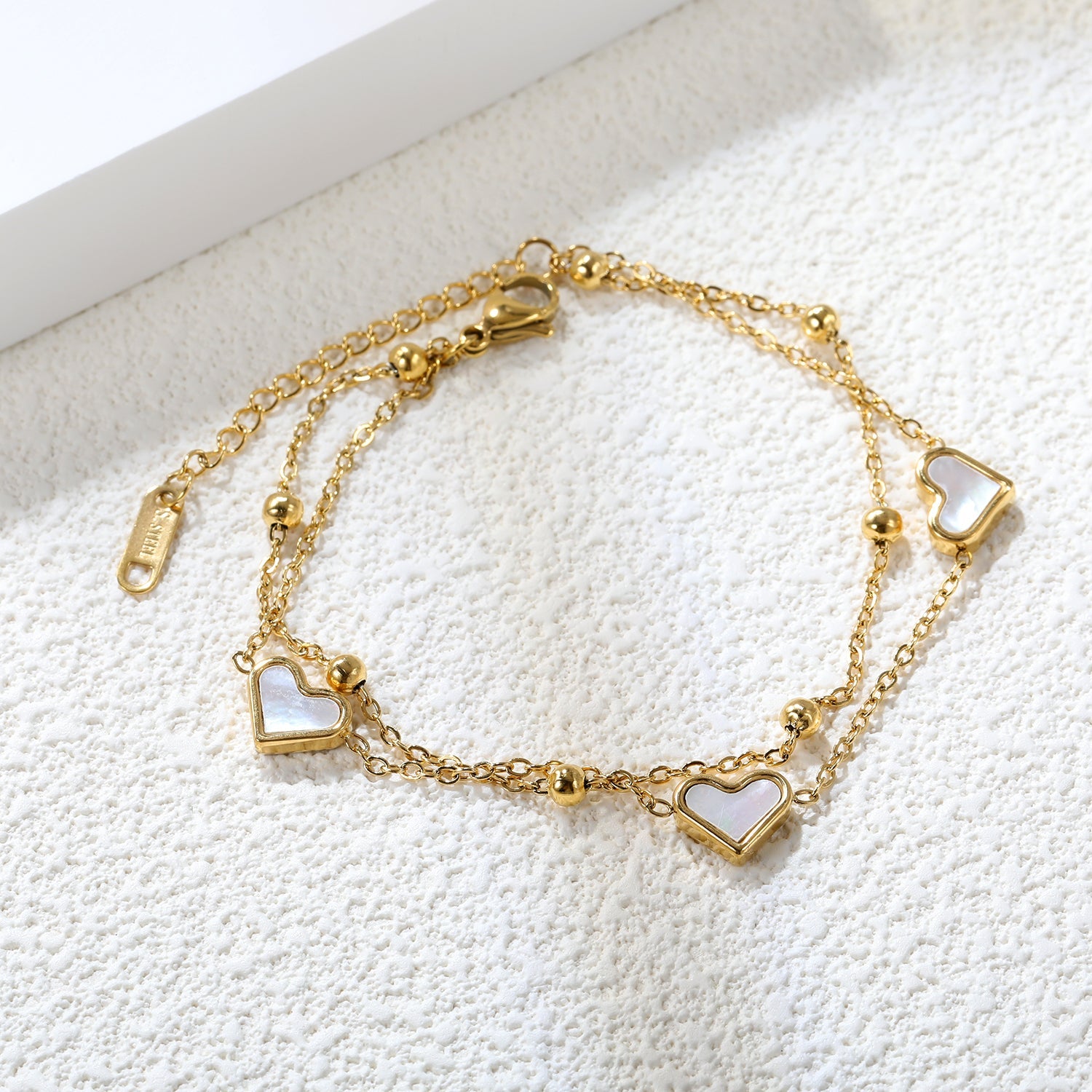 Chaîne à main double en coquillage blanc en forme de cœur