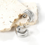 Dubbele C-vormige hoepeloorbellen