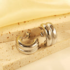 Dubbele C-vormige hoepeloorbellen