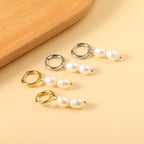 Lentecirkeloorbellen met witte parels