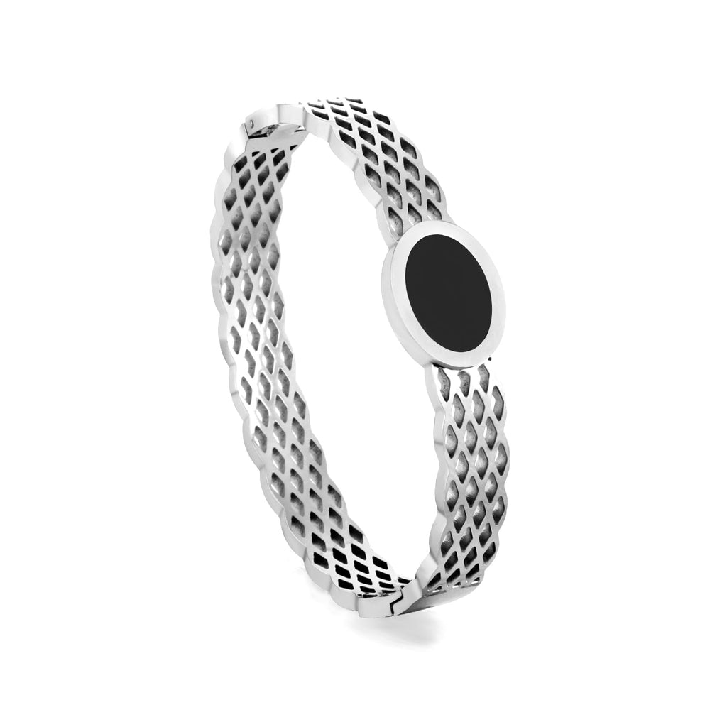 Geweven mesh-armband met zwarte ronde oliedruppels.