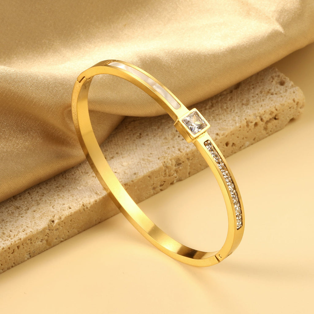 Rechthoekige armband met schelp en diamant