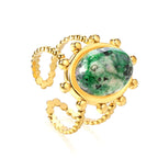 Enkele bandring met heldere, turquoise en anthofyllietstenen