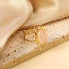 Enkele bandring met heldere, turquoise en anthofyllietstenen