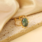 Enkele bandring met heldere, turquoise en anthofyllietstenen