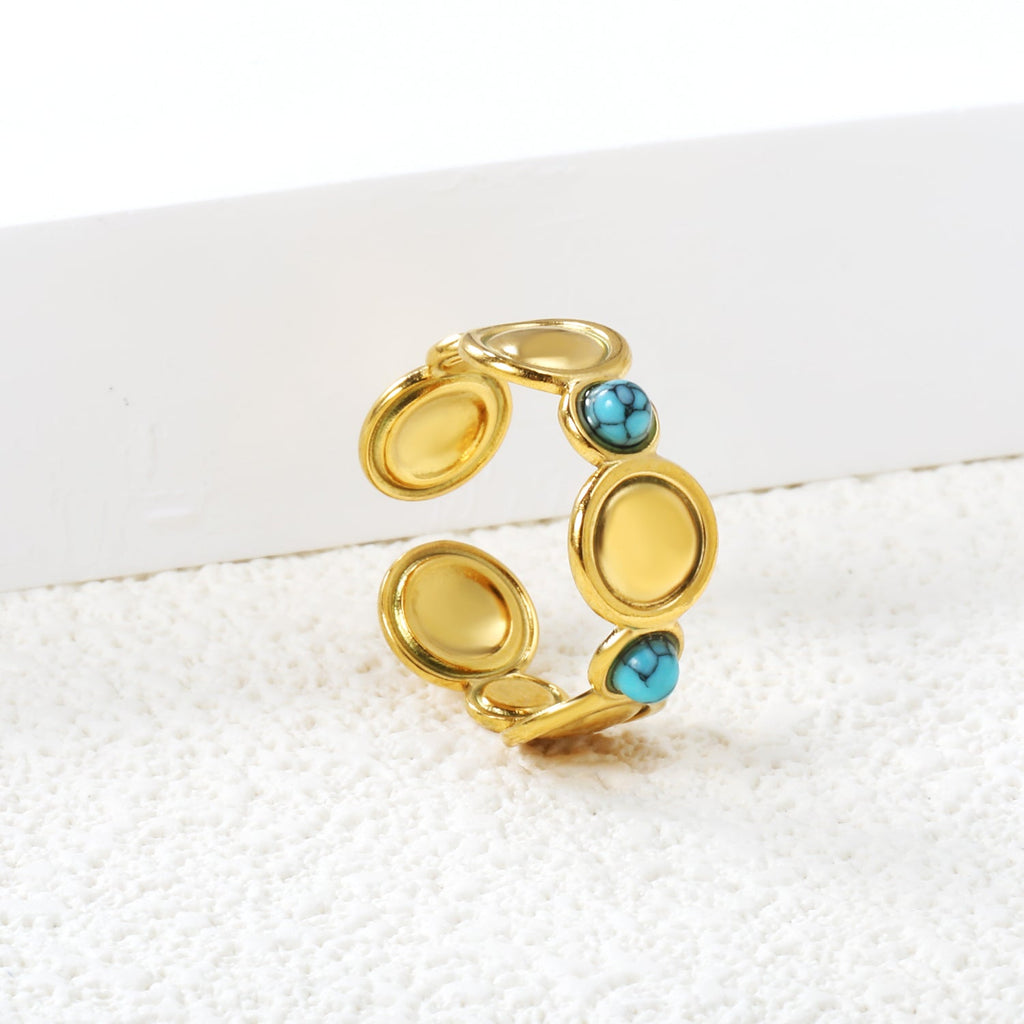 Ring met schijf en turquoise steen