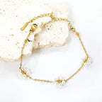 Bracelet Fleur Acier et Perle Blanche