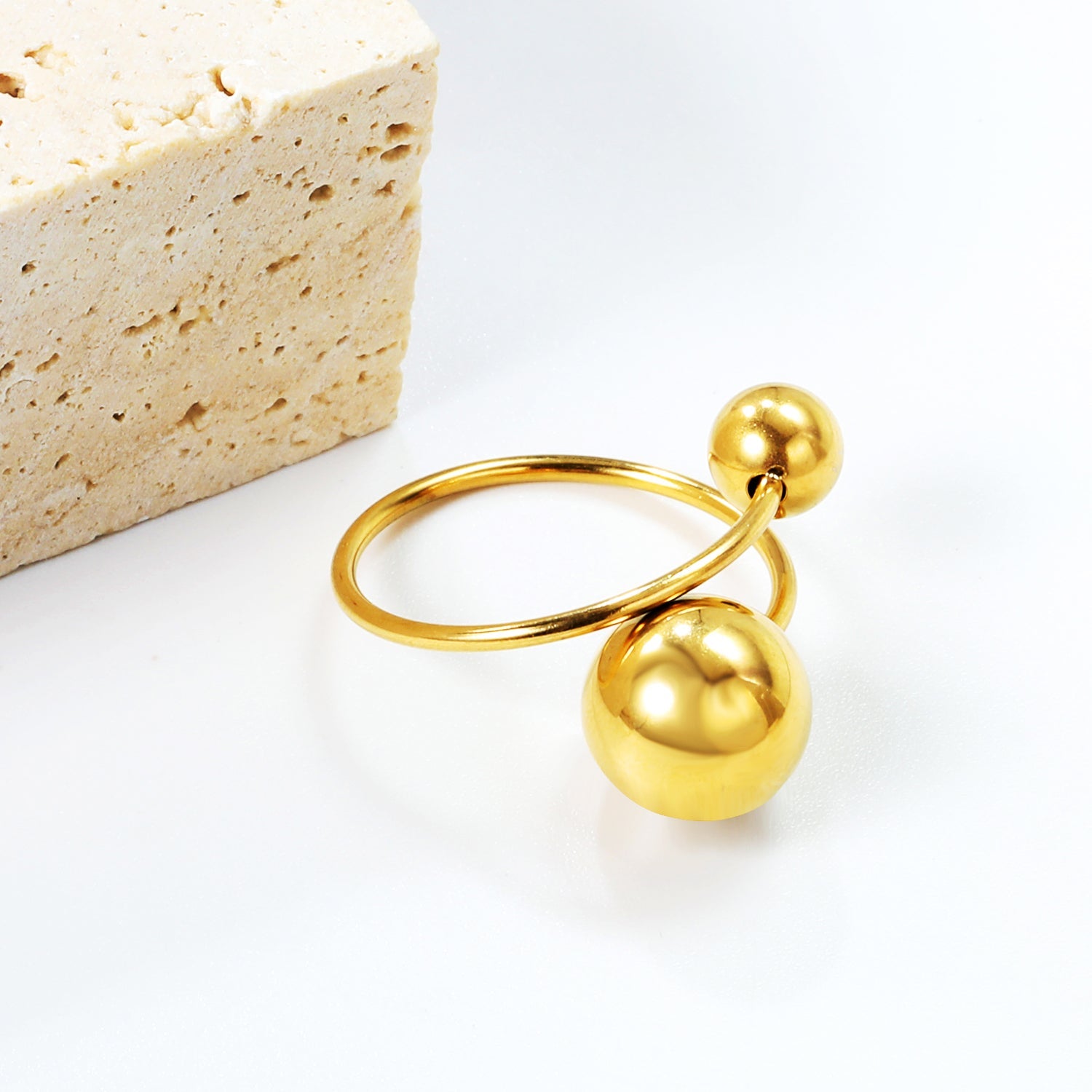 Grote en kleine bolvormige open roestvrijstalen ring