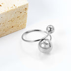 Grote en kleine bolvormige open roestvrijstalen ring