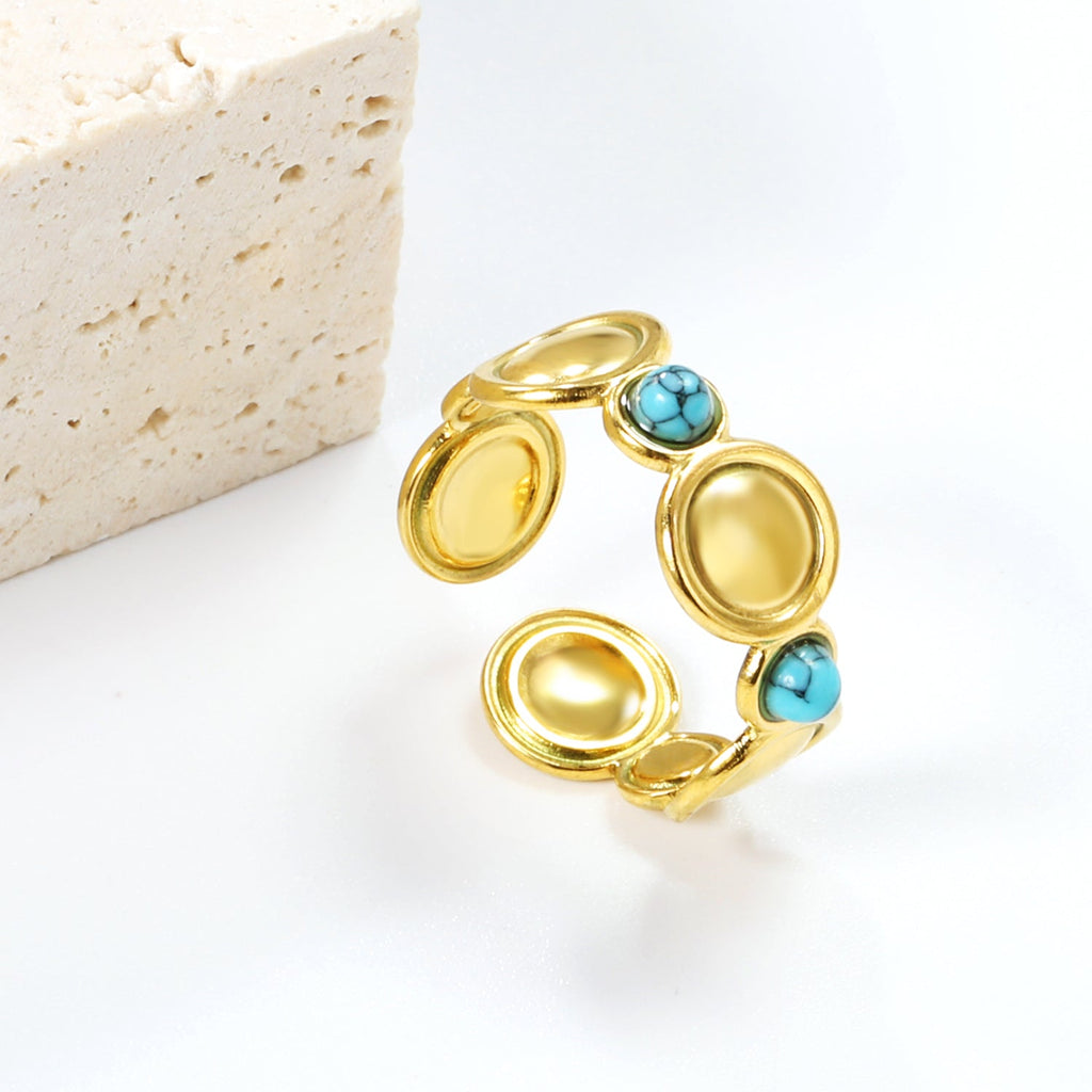 Ring met schijf en turquoise steen