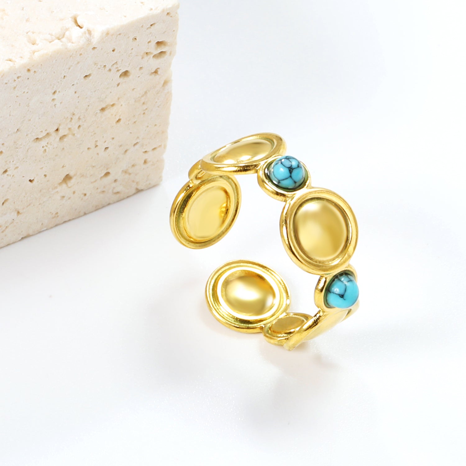 Ring met schijf en turquoise steen