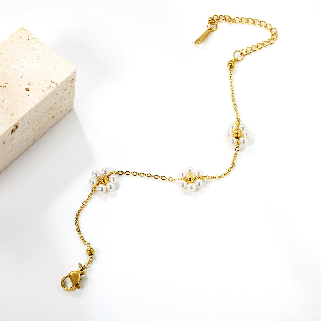 Bracelet Fleur Acier et Perle Blanche